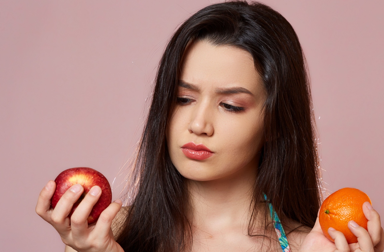 Someone who had a root canal considers if they can eat an apple or orange.